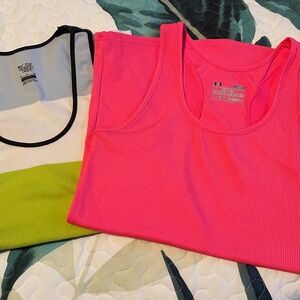 Two tank tops. Under Armour and Nike. Like new. Medium